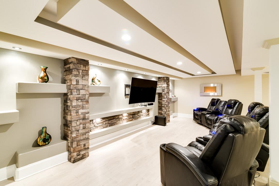 433 Cedarcliff Road Antioch, TN 37013 - Photo 3 of 30 Incredible media room with built in shelves and beautiful ceiling detail. Media sofas will remain.