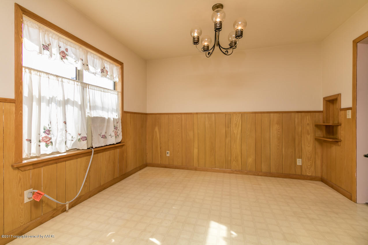 4117 South Travis Street Amarillo, TX 79110 - Photo 3 of 12 a view of a room with window