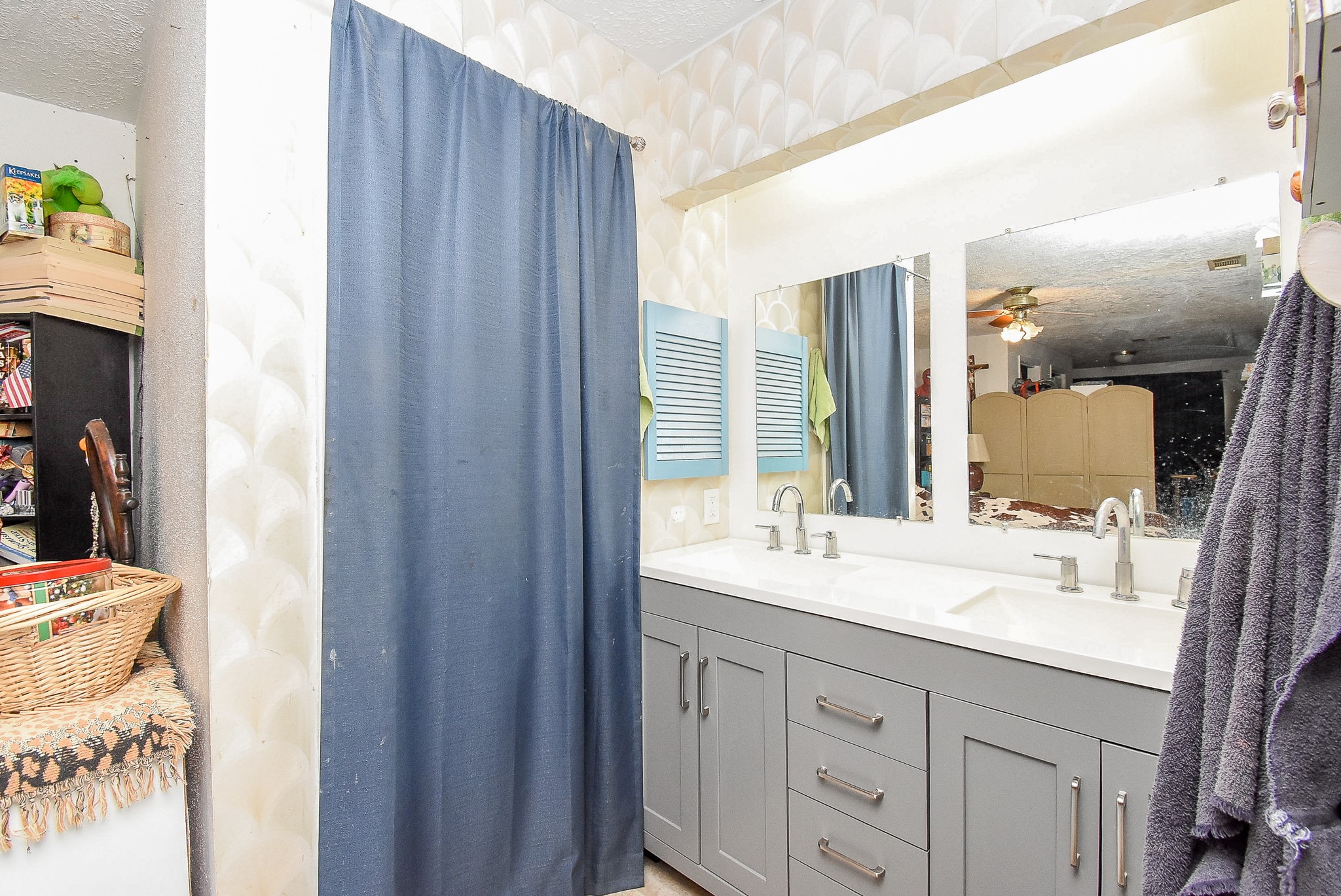 23003 Good Dale Lane Spring, TX 77373 - Photo 11 of 13 a bathroom with a double vanity sink and a mirror