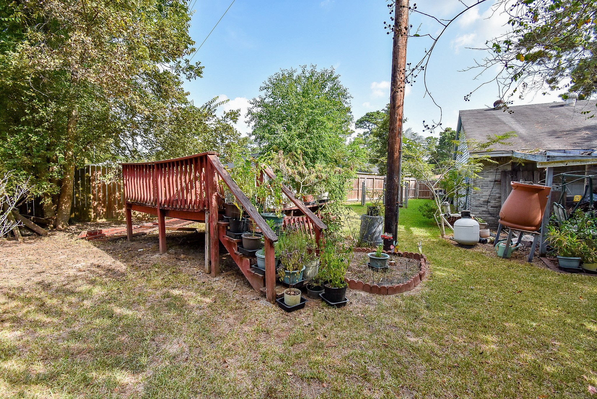 23003 Good Dale Lane Spring, TX 77373 - Photo 13 of 13 a view of a backyard with furniture and a fire pit