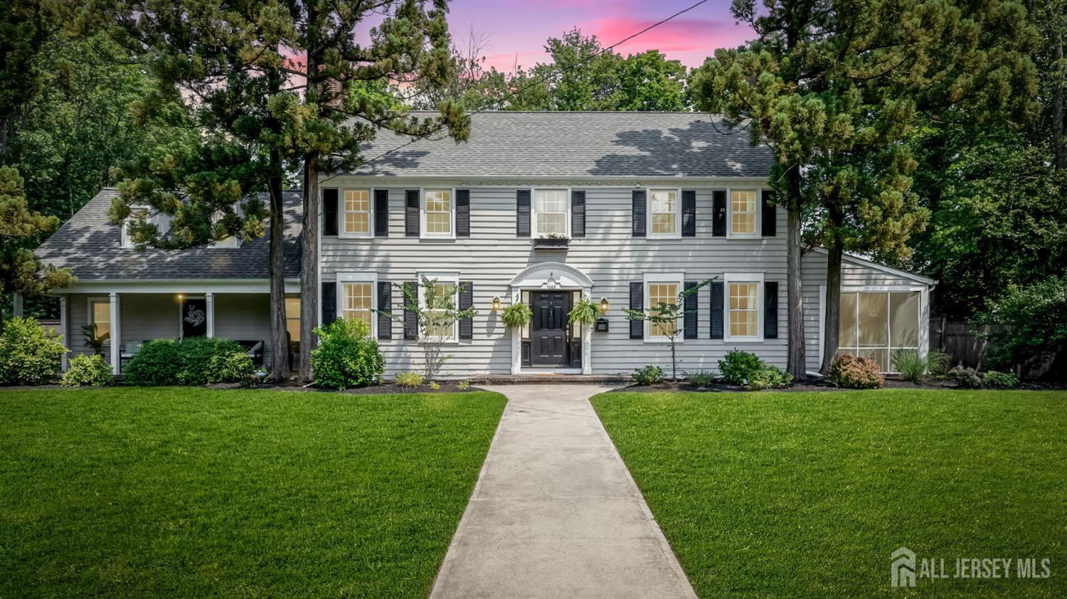 1085 Kenyon Avenue Plainfield, NJ 07060 - Photo 1 of 50 a front view of a house with a yard