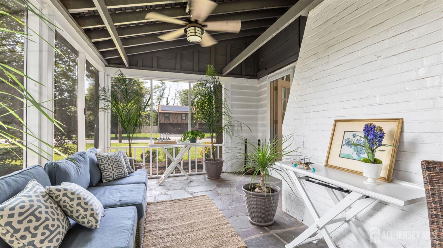 1085 Kenyon Avenue Plainfield, NJ 07060 - Photo 11 of 50 a living room with furniture and a potted plant