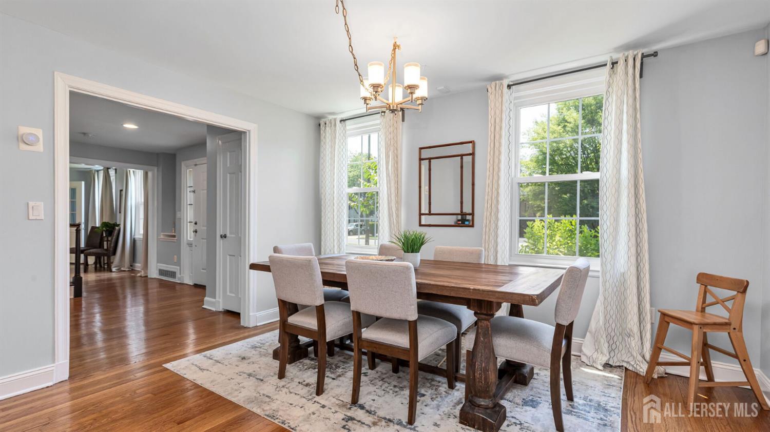 1085 Kenyon Avenue Plainfield, NJ 07060 - Photo 13 of 50 a view of a dining room with furniture window and wooden floor