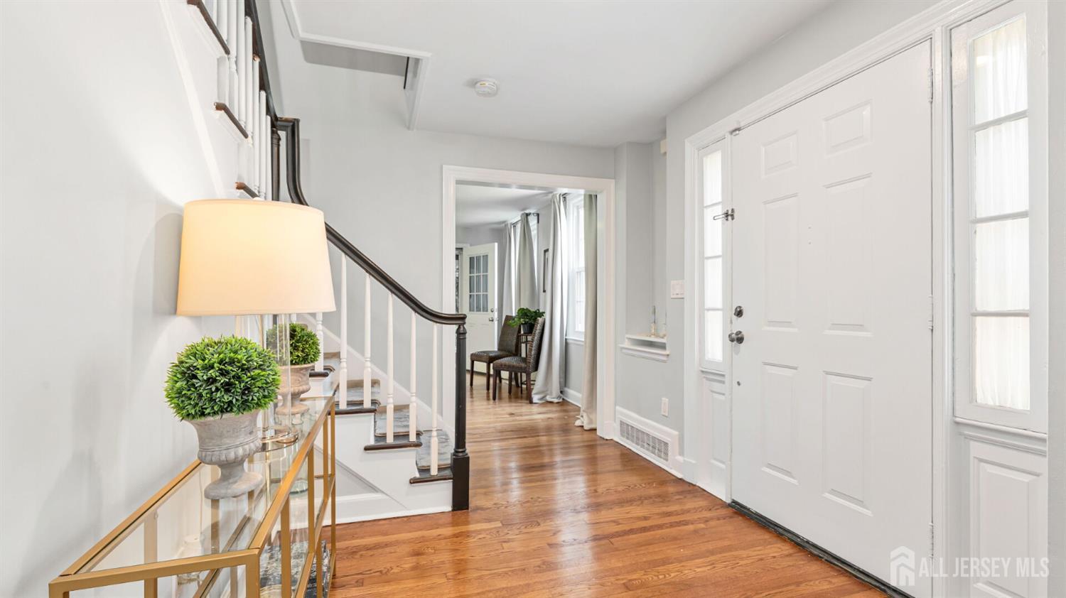 1085 Kenyon Avenue Plainfield, NJ 07060 - Photo 2 of 50 a view of entryway and hall with wooden floor