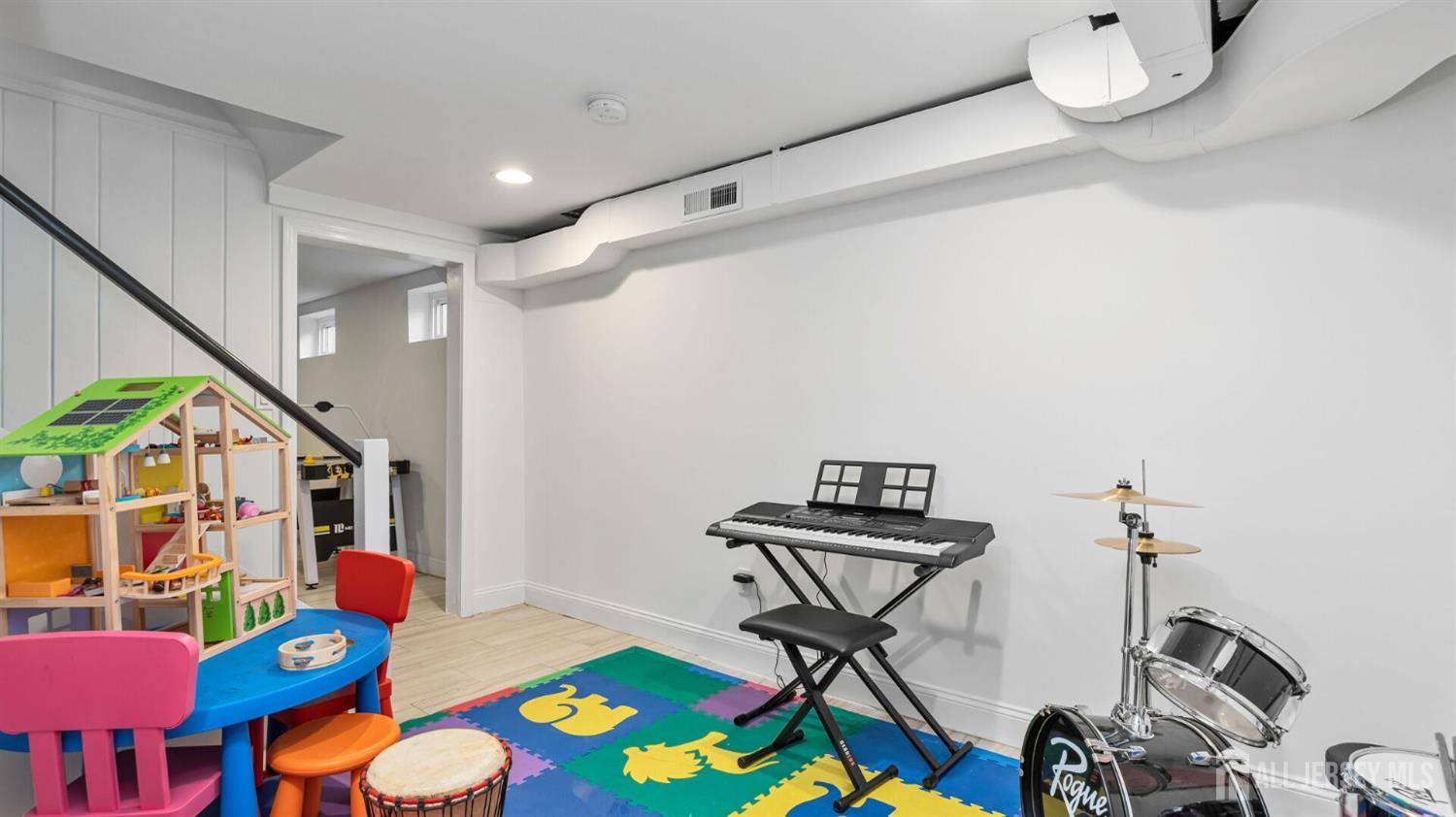 1085 Kenyon Avenue Plainfield, NJ 07060 - Photo 23 of 50 a bedroom with furniture and a window