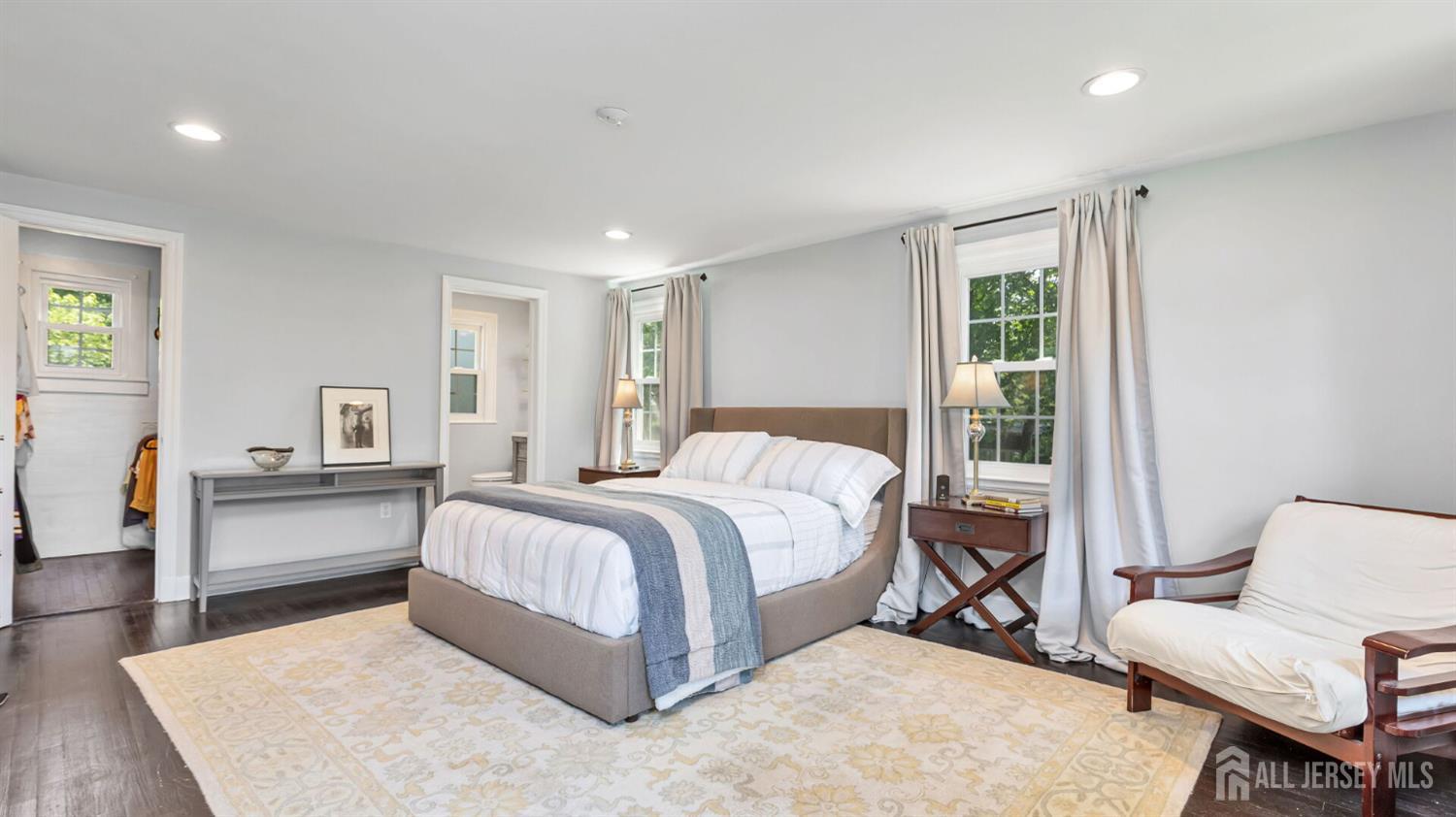 1085 Kenyon Avenue Plainfield, NJ 07060 - Photo 27 of 50 a spacious bedroom with a bed and wooden floor