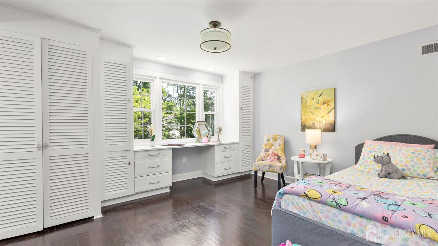 1085 Kenyon Avenue Plainfield, NJ 07060 - Photo 31 of 50 a bedroom with a bed and a window