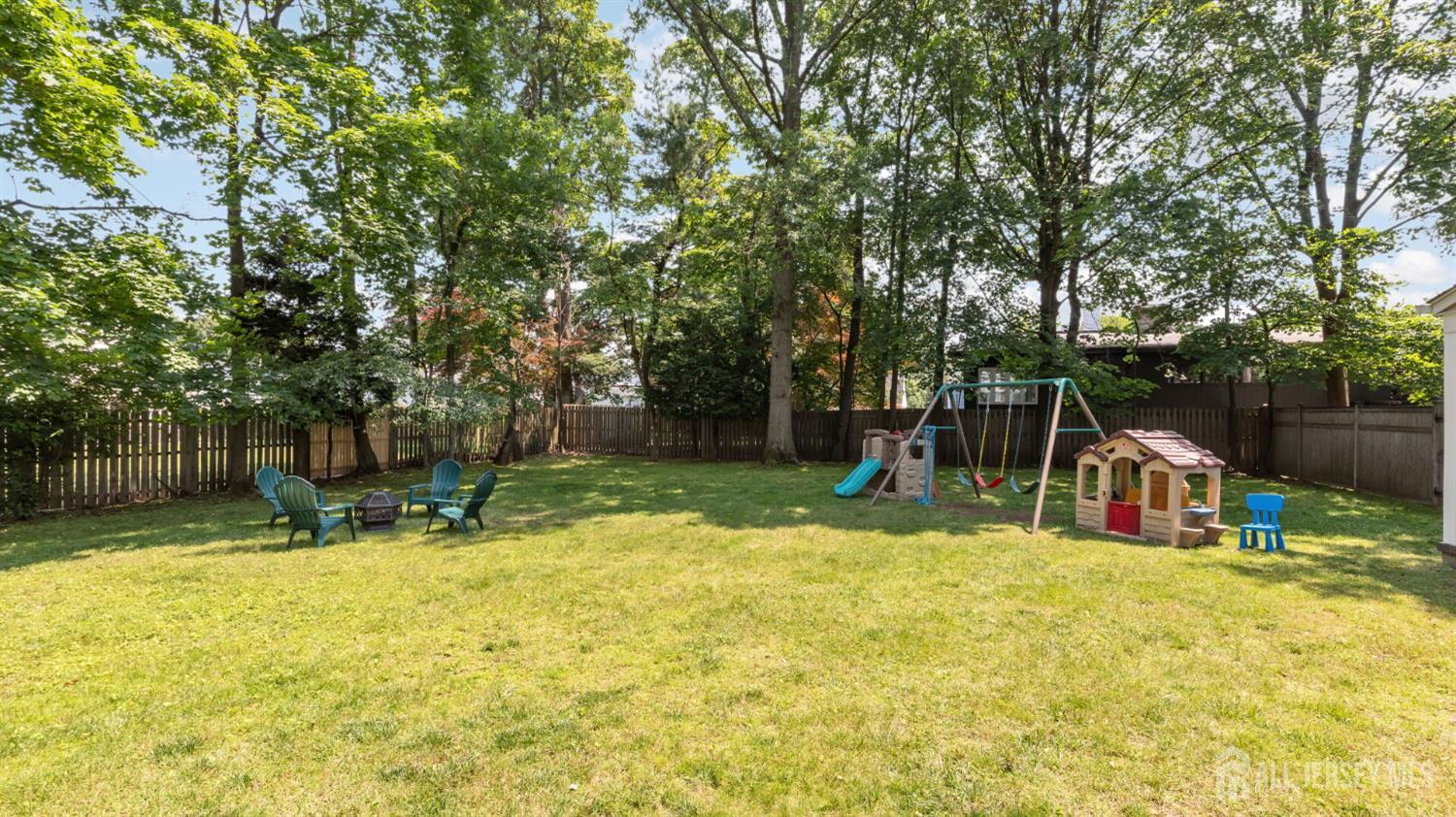 1085 Kenyon Avenue Plainfield, NJ 07060 - Photo 38 of 50 a view of swimming pool with a bench and trees