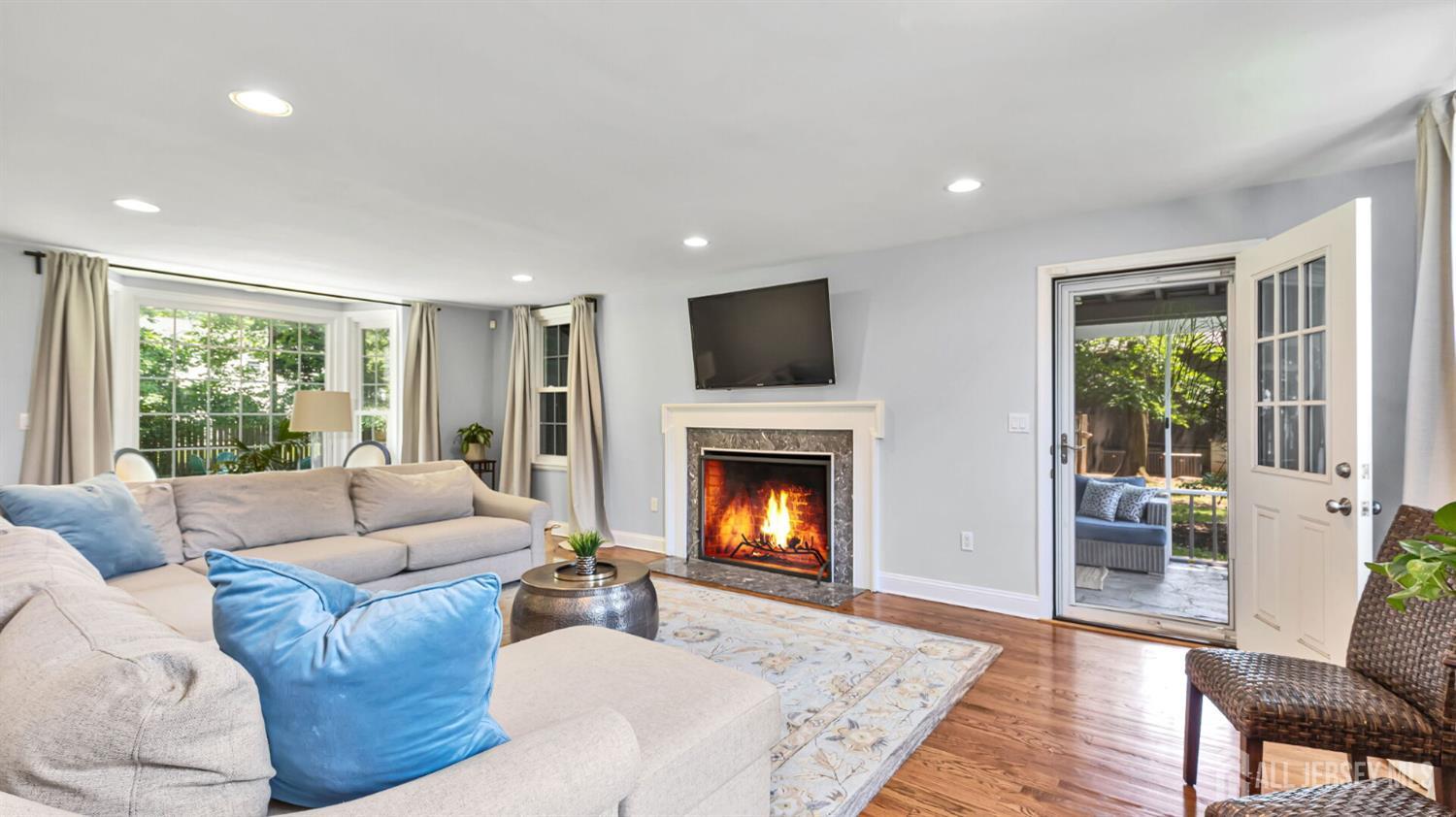 1085 Kenyon Avenue Plainfield, NJ 07060 - Photo 4 of 50 a living room with furniture and a fireplace