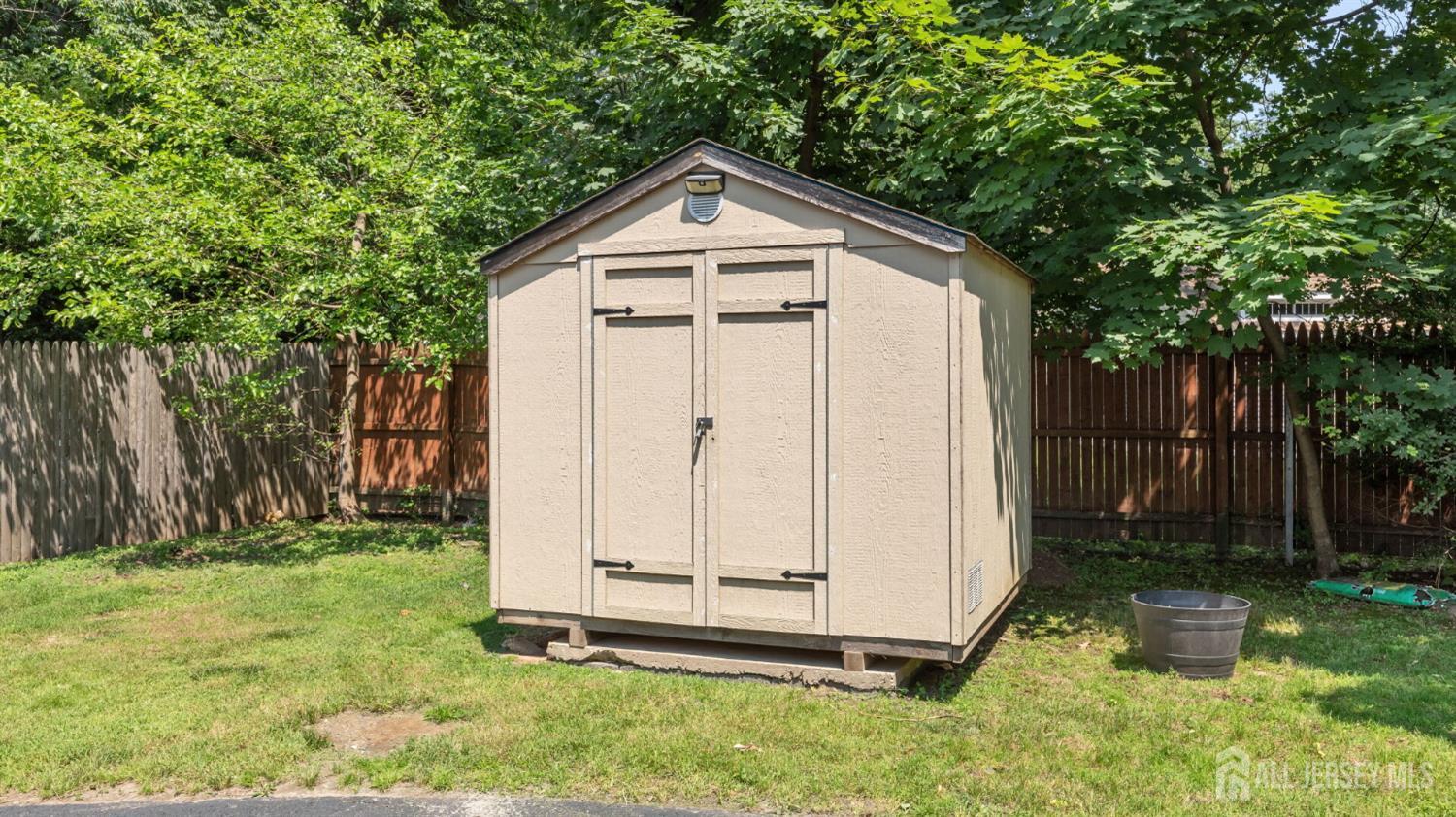 1085 Kenyon Avenue Plainfield, NJ 07060 - Photo 47 of 50 a front view of a house with a yard