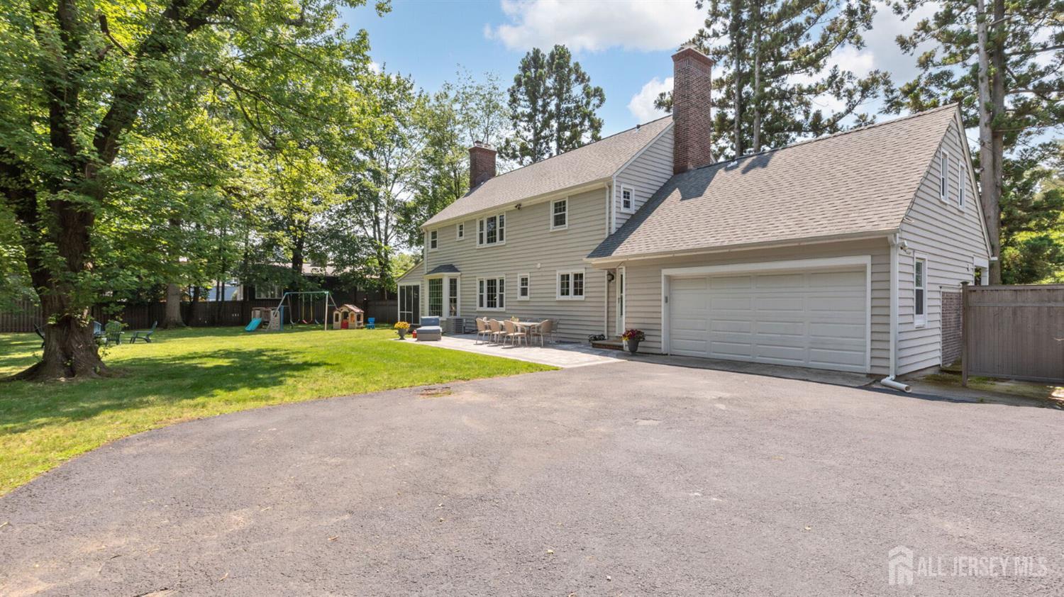 1085 Kenyon Avenue Plainfield, NJ 07060 - Photo 48 of 50 a view of a house with swimming pool and yard