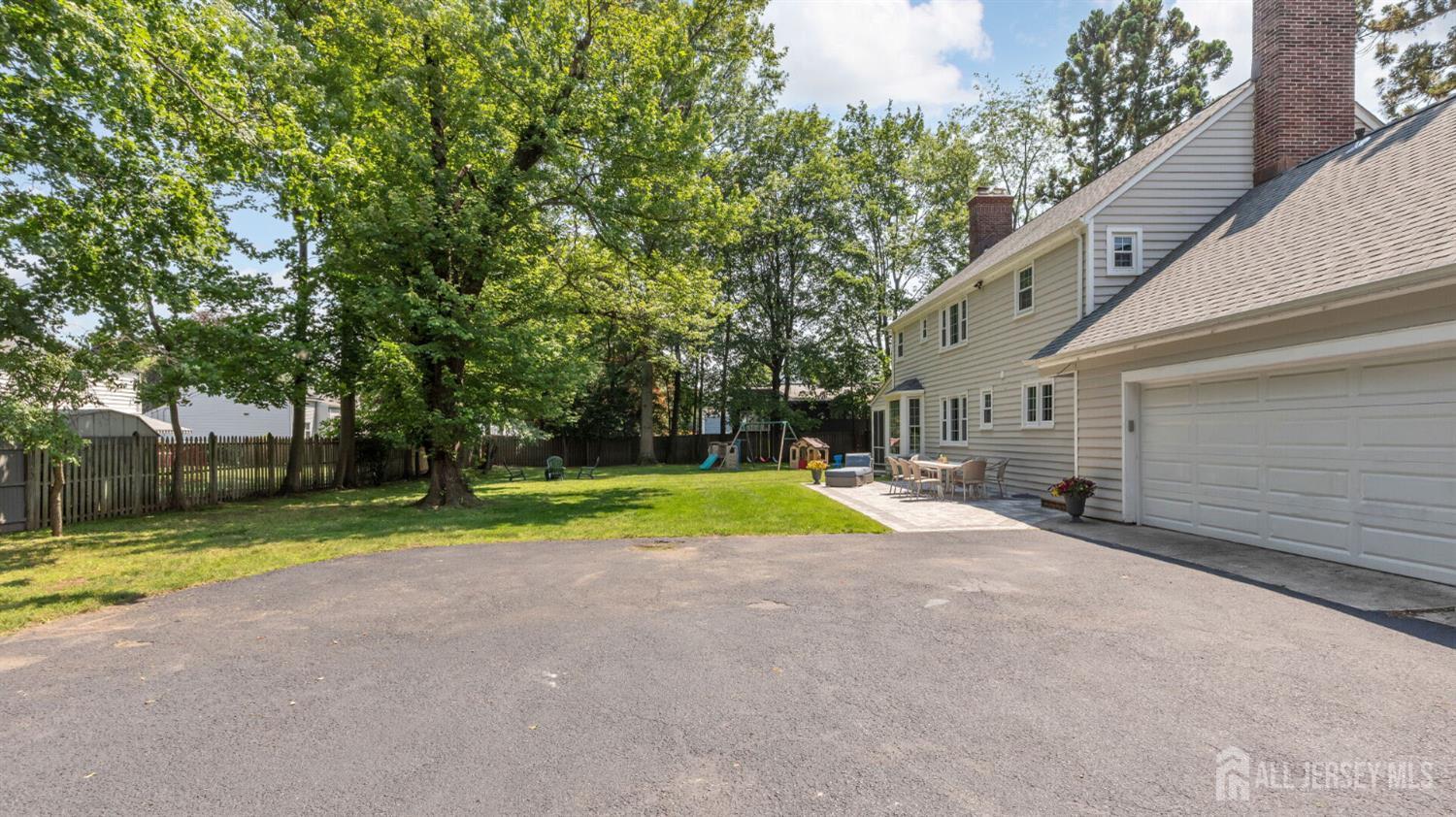 1085 Kenyon Avenue Plainfield, NJ 07060 - Photo 49 of 50 a view of backyard with trampoline