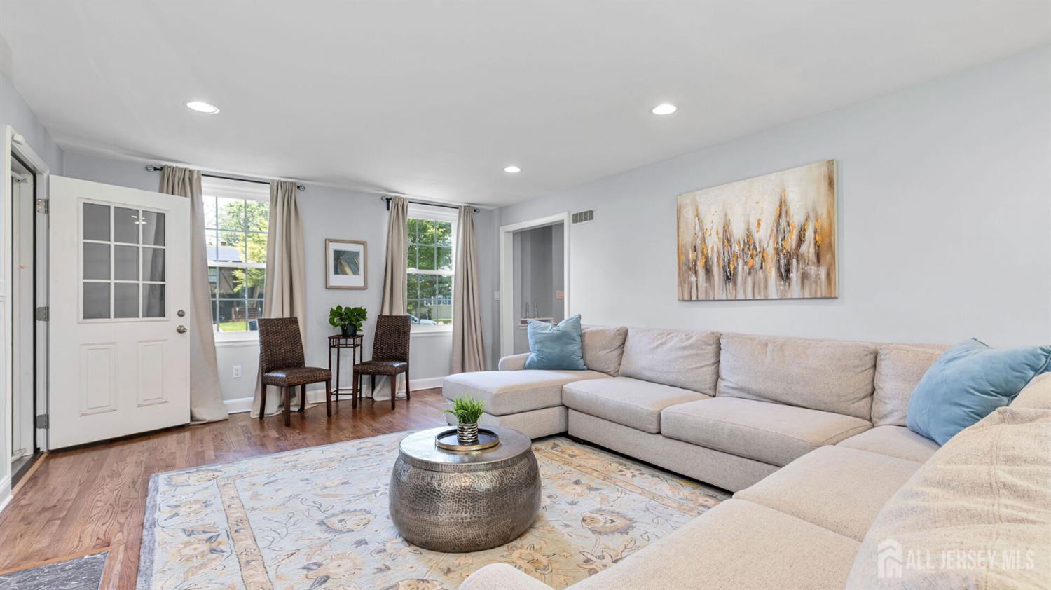 1085 Kenyon Avenue Plainfield, NJ 07060 - Photo 7 of 50 a living room with furniture and a window