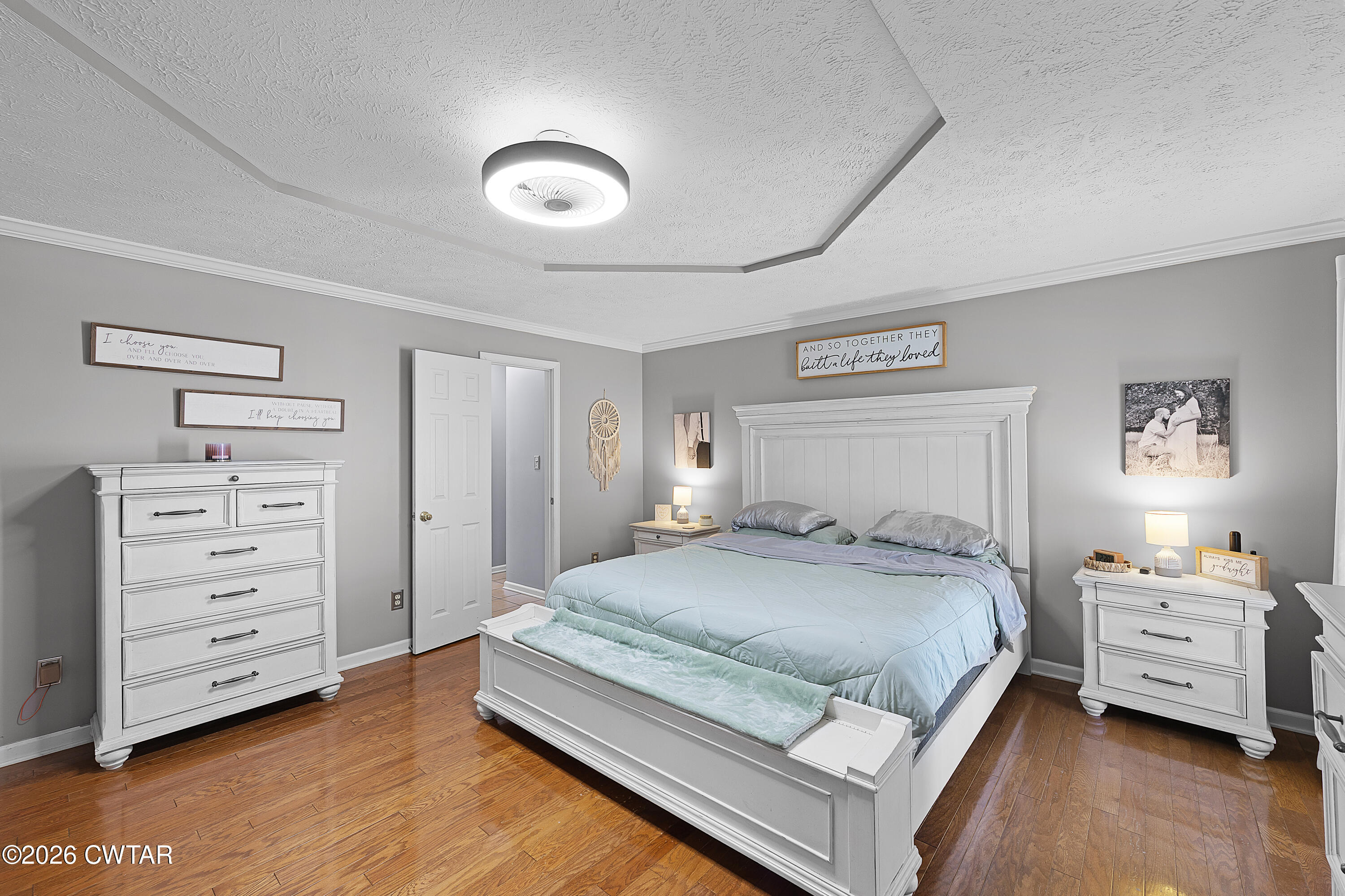 184 Deep Gap Road Jackson, TN 38301 - Photo 12 of 31 a bedroom with a bed and a tv