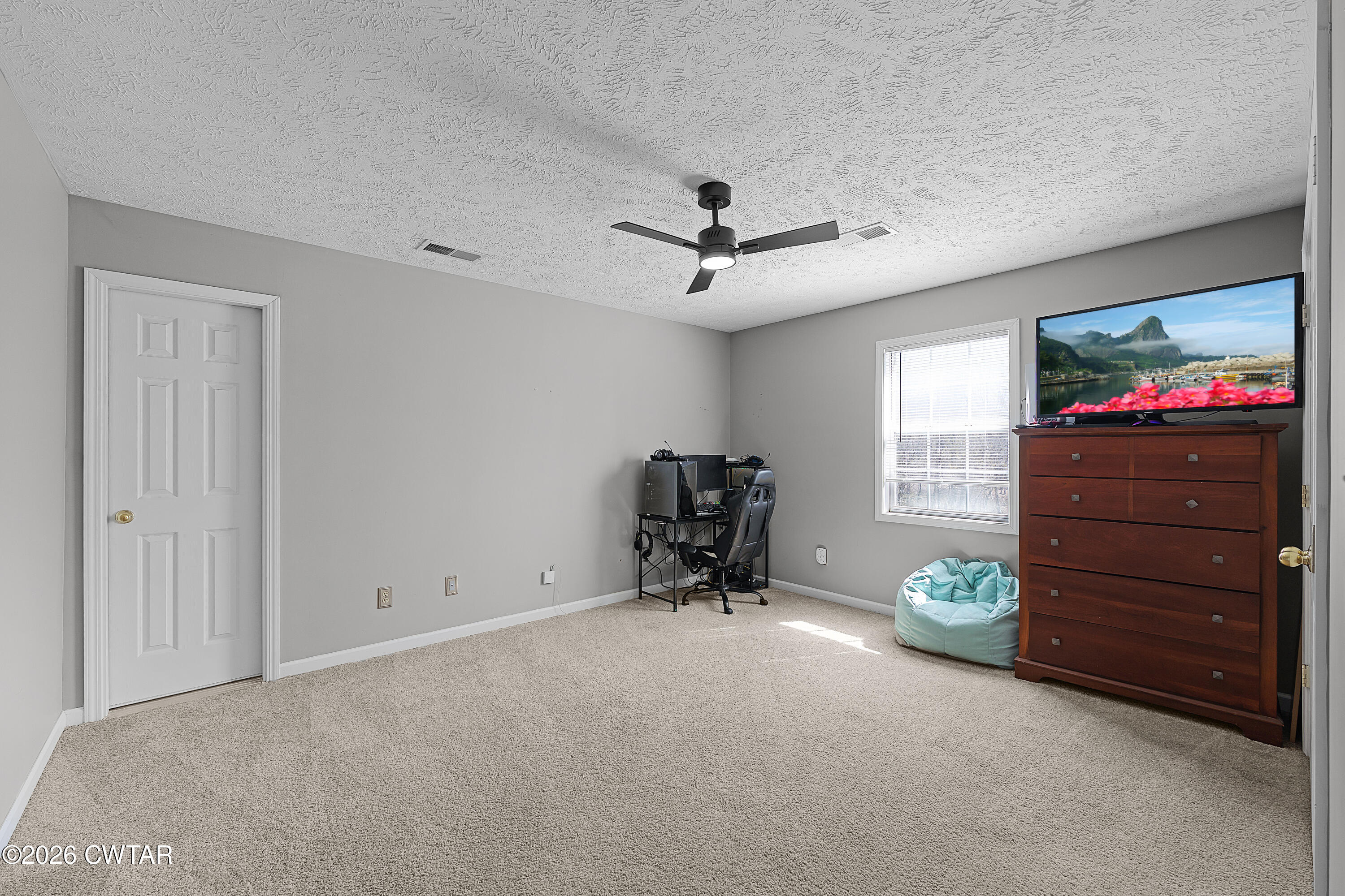 184 Deep Gap Road Jackson, TN 38301 - Photo 21 of 31 a view of a workspace with furniture and a window