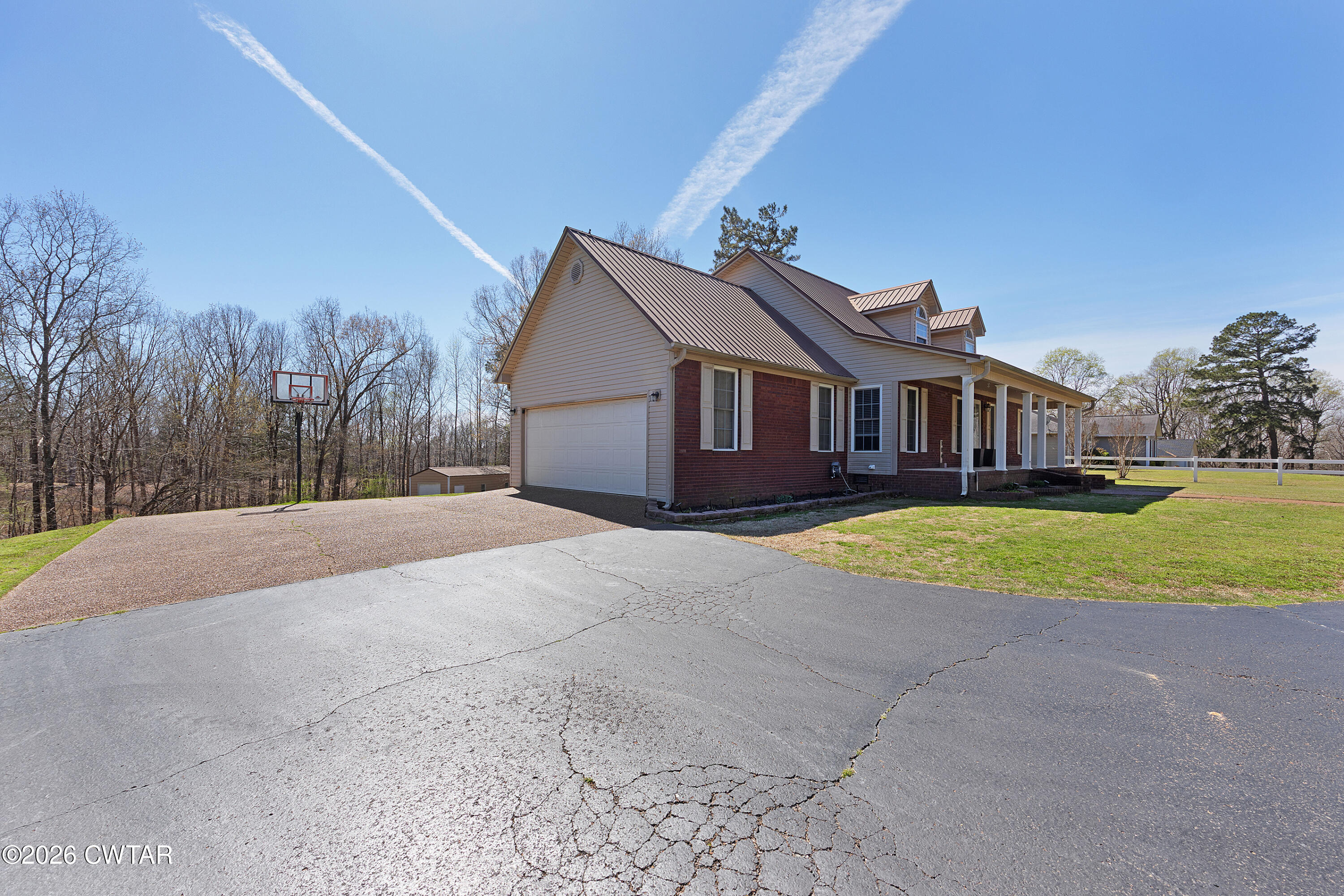 184 Deep Gap Road Jackson, TN 38301 - Photo 26 of 31 a view of house with outdoor space and swimming pool