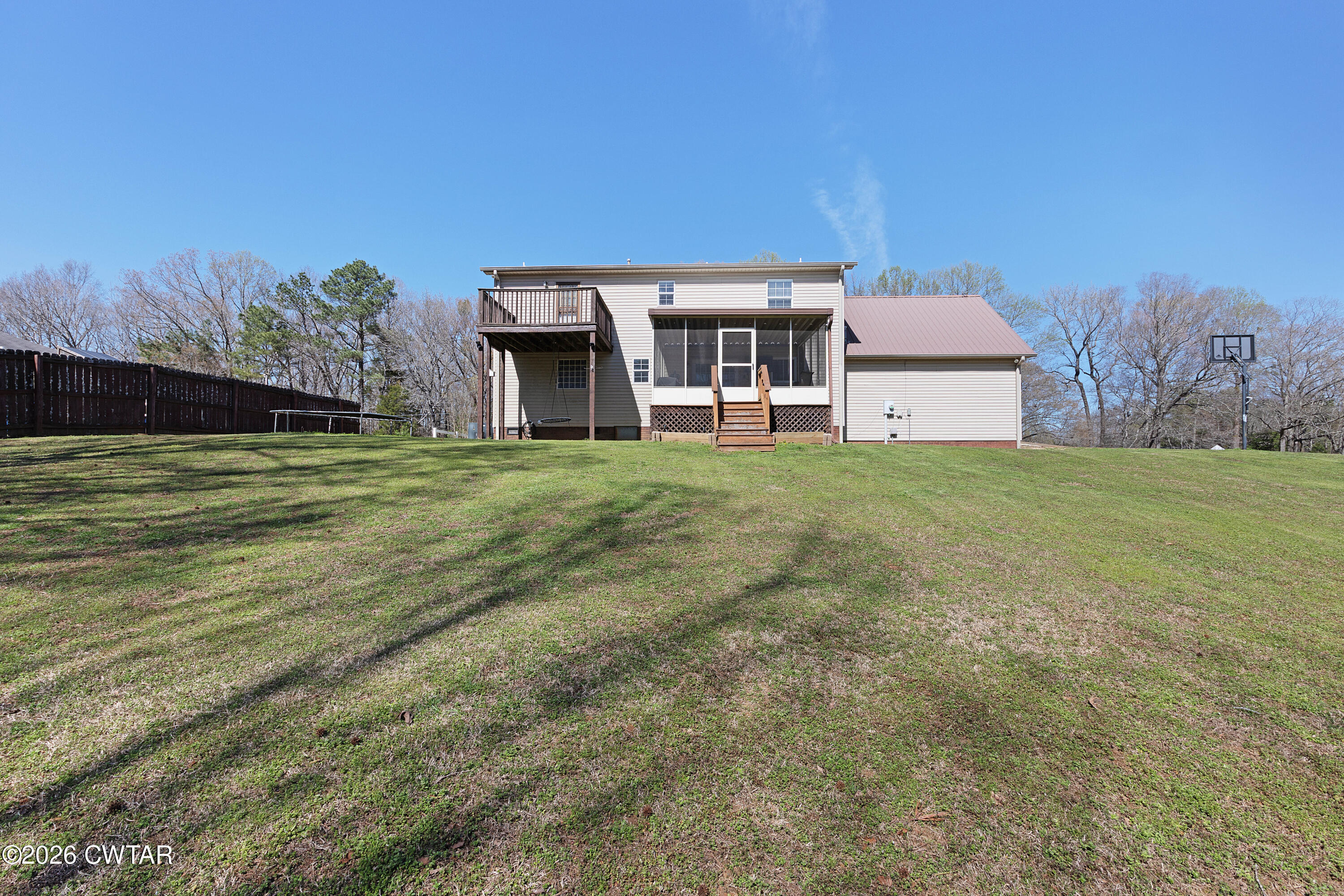 184 Deep Gap Road Jackson, TN 38301 - Photo 29 of 31 a house with huge green field in front of it
