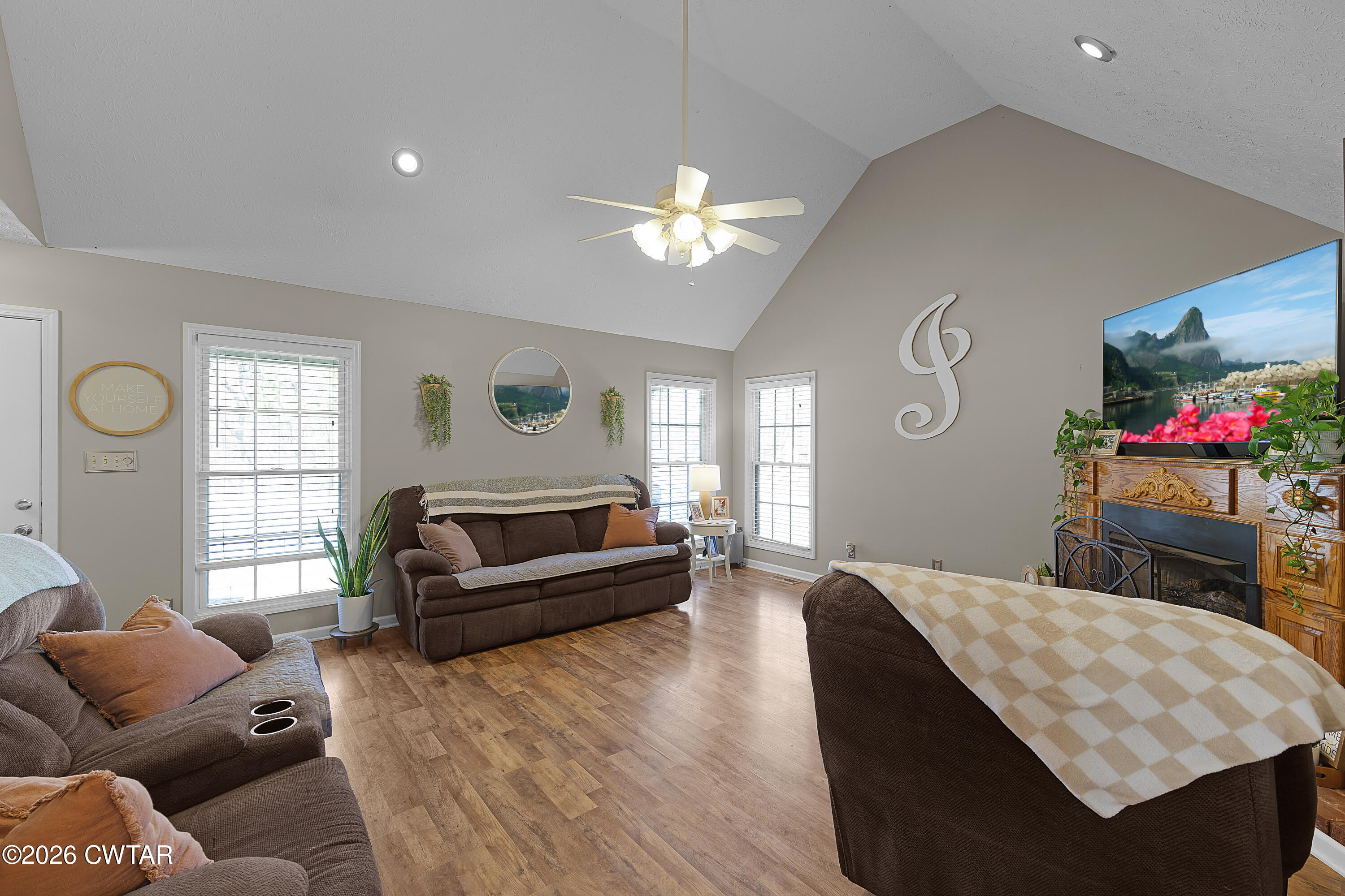 184 Deep Gap Road Jackson, TN 38301 - Photo 5 of 31 a living room with furniture and a chandelier