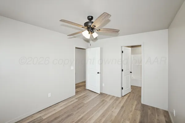 a view of an empty room and window