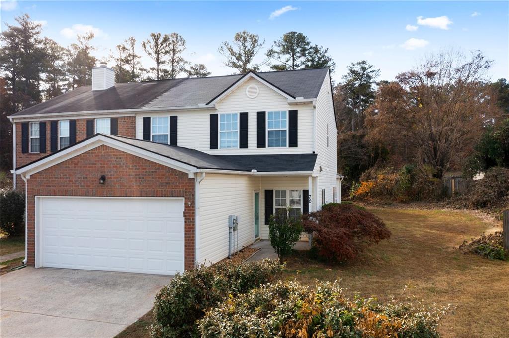70 Berkeley Place Cartersville, GA 30121 - Photo 1 of 1 a front view of a house with a yard