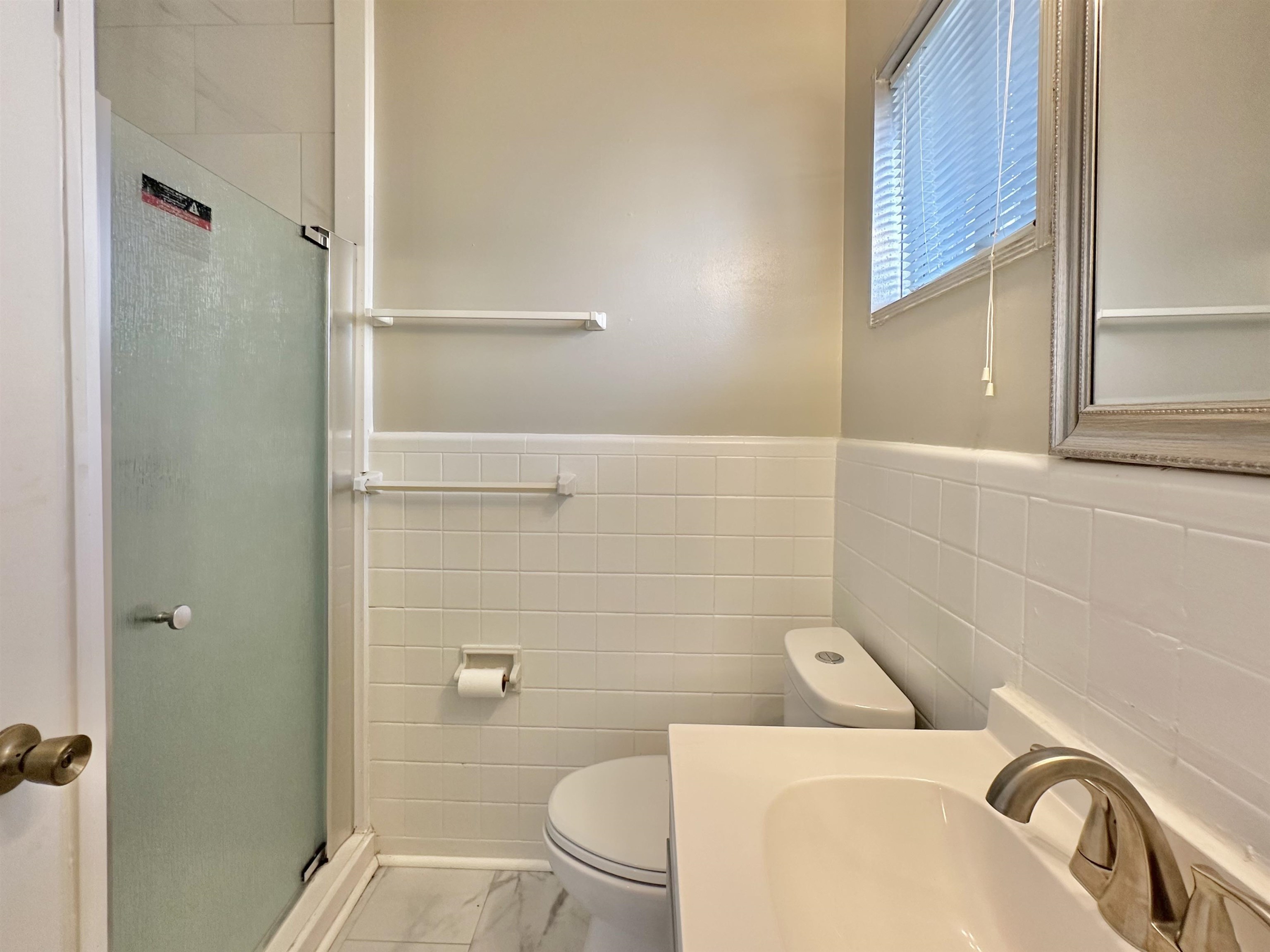 141 North White Station Road Memphis, TN 38117 - Photo 15 of 24 a bathroom with a toilet and a shower