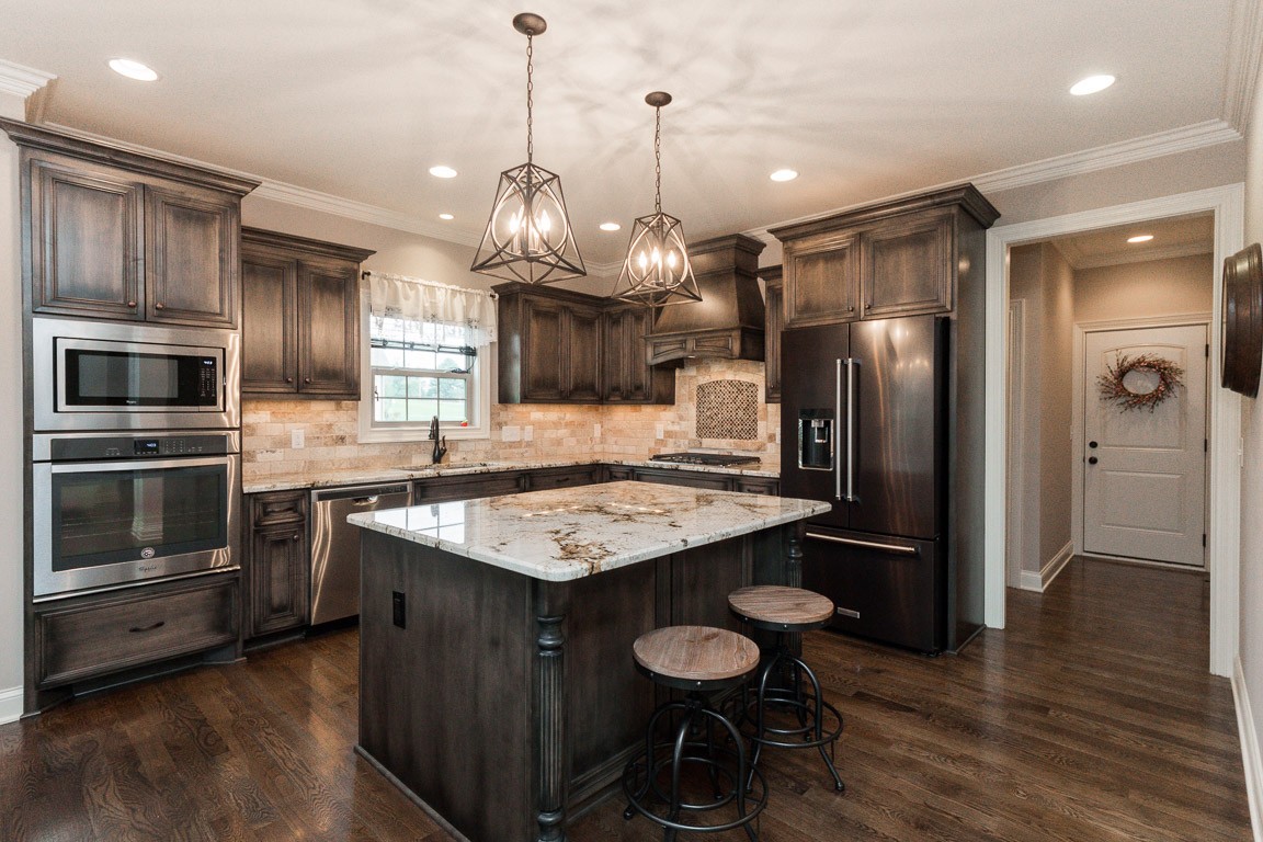 855 Philadelphia Road Lebanon, TN 37087 - Photo 1 of 30 a kitchen with stainless steel appliances granite countertop a refrigerator a stove a sink and a refrigerator