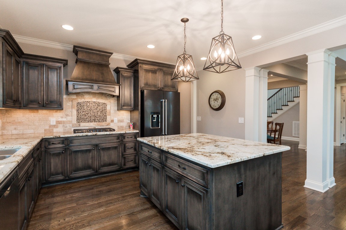 855 Philadelphia Road Lebanon, TN 37087 - Photo 16 of 30 a kitchen with stainless steel appliances granite countertop a sink a stove and a wooden floors