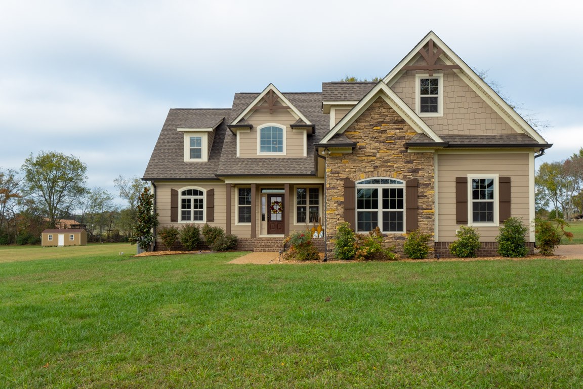 855 Philadelphia Road Lebanon, TN 37087 - Photo 2 of 30 a front view of a house with a yard and trees