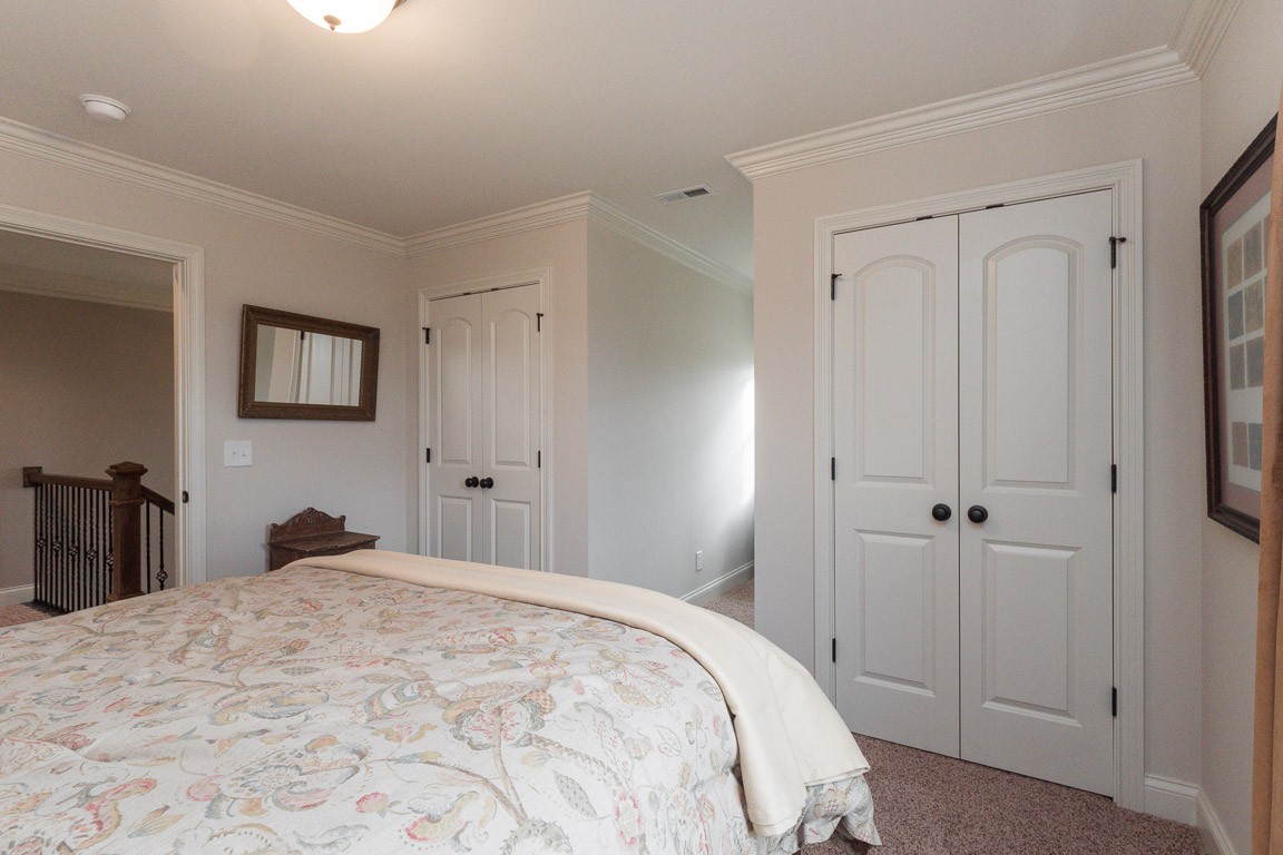 855 Philadelphia Road Lebanon, TN 37087 - Photo 25 of 30 a bedroom with a bed and closet