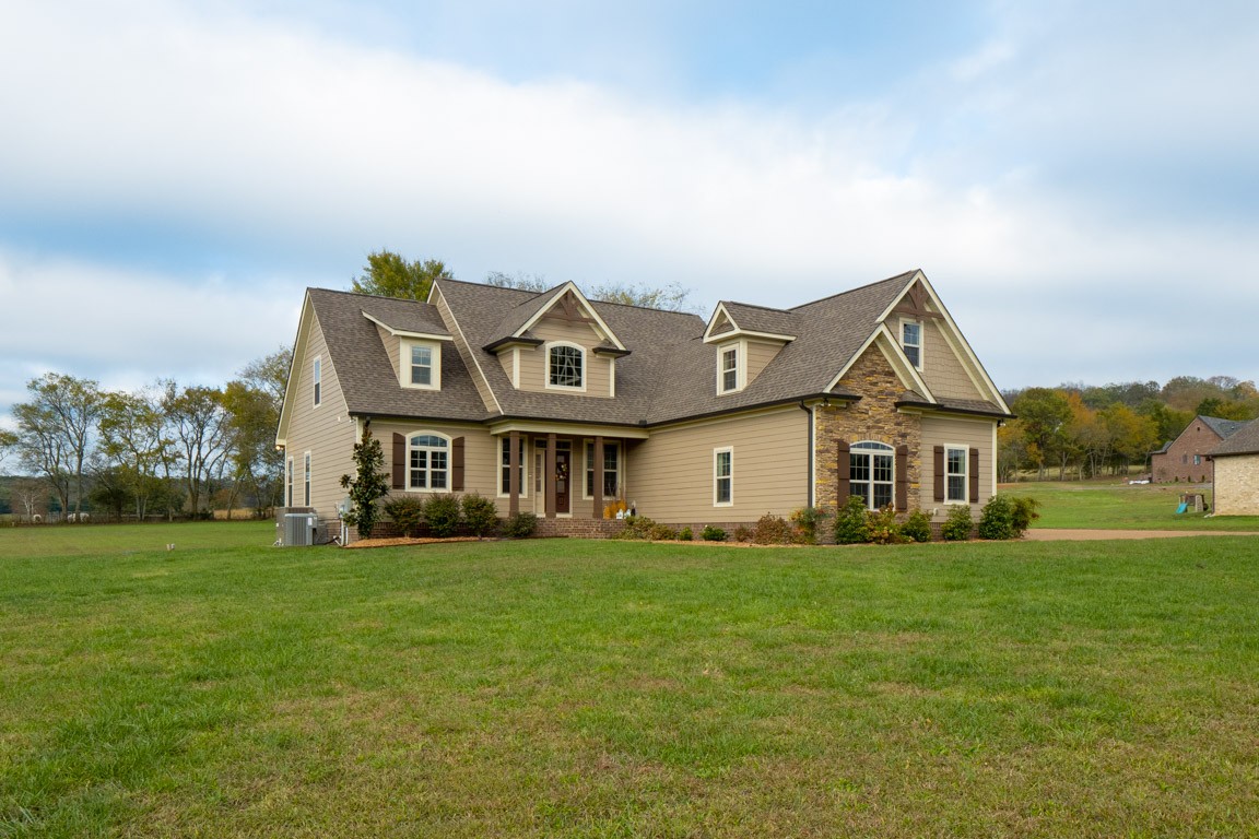 855 Philadelphia Road Lebanon, TN 37087 - Photo 3 of 30 a view of a house with a big yard and large trees