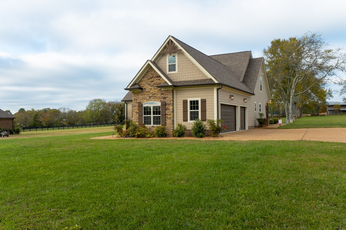 855 Philadelphia Road Lebanon, TN 37087 - Photo 4 of 30 a front view of a house with a yard