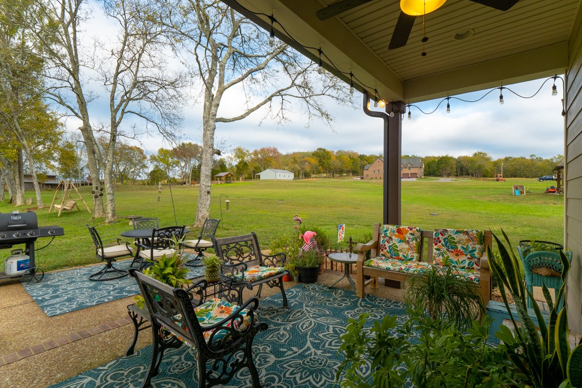 855 Philadelphia Road Lebanon, TN 37087 - Photo 8 of 30 an outdoor space with furniture and garden view