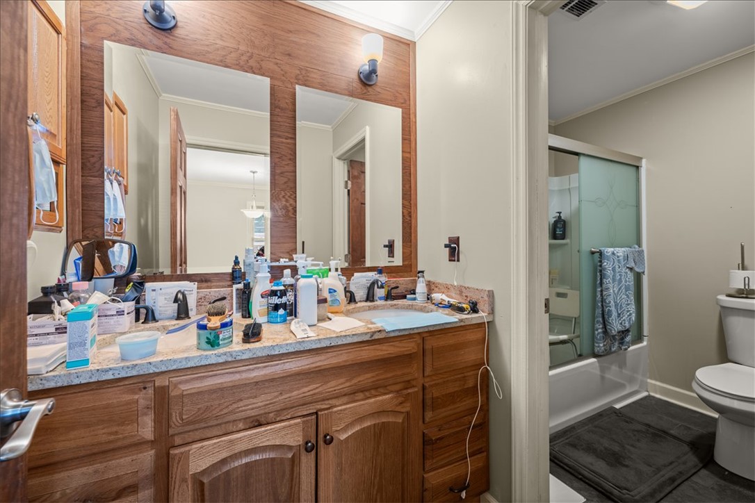 412 Sanders Street Anderson, SC 29624 - Photo 20 of 30 Double vanity with ample counter space and a convenient shower-tub combination.