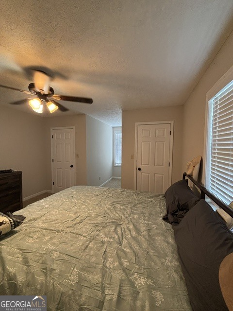 771 Hamilton Road Concord, GA 30206 - Photo 23 of 30 a bedroom with a bed and a chair