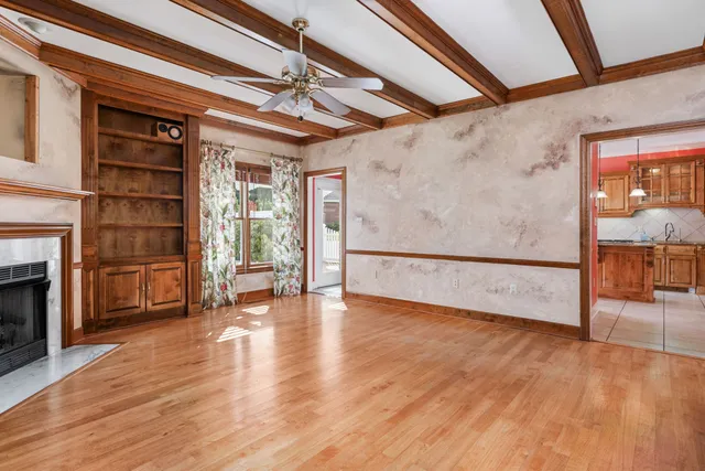 a view of a kitchen with a sink cabinets and a window