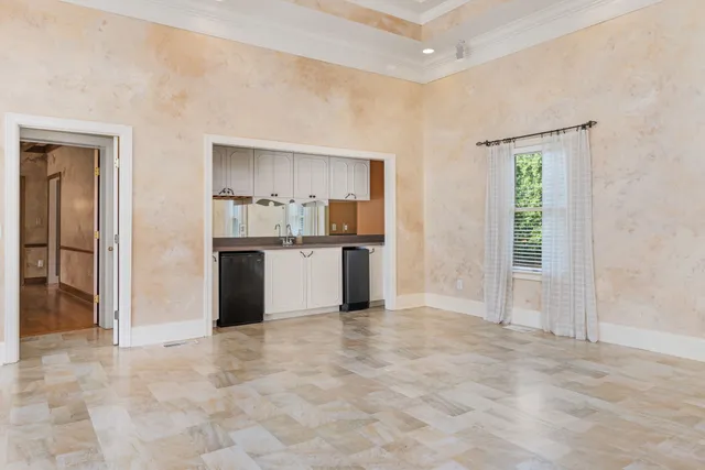 a bathroom with a double vanity sink and mirror
