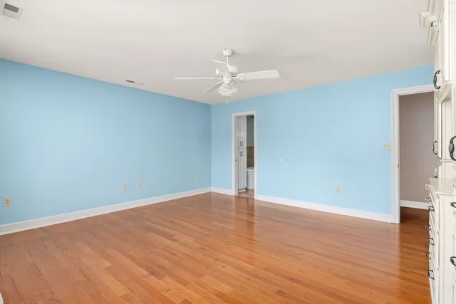 a bathroom with a bath tub and shower