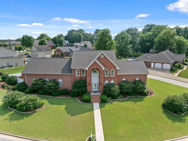 a aerial view of a house with garden