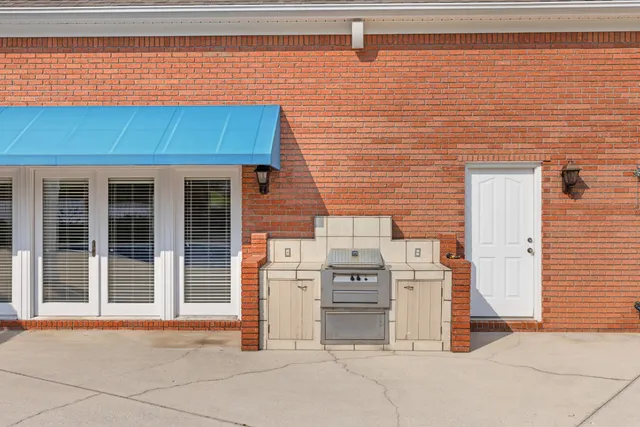 an aerial view of a house with a garden