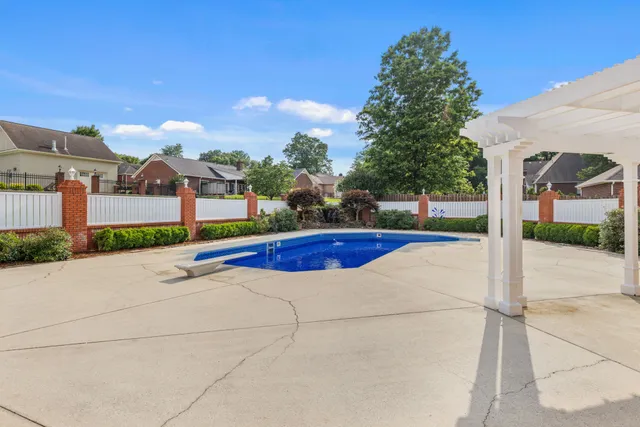 an aerial view of a house with a garden