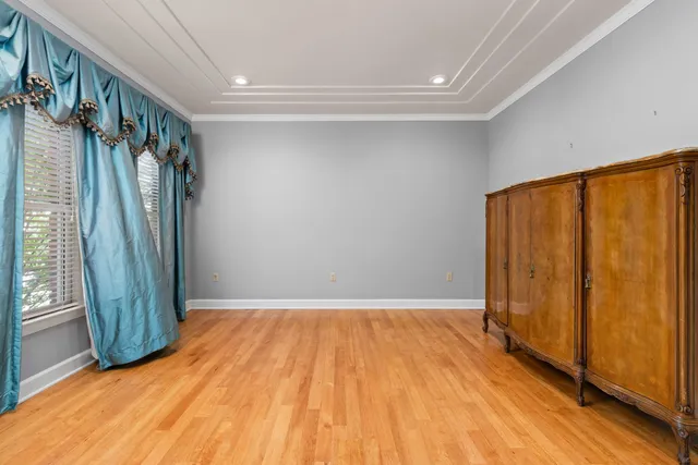 a kitchen with stainless steel appliances granite countertop a refrigerator and a stove