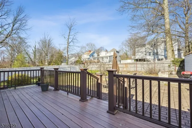 a view of a balcony with wooden floor