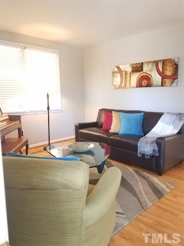 800 Newcombe Road Raleigh, NC 27610 - Photo 8 of 14 a living room with a couch