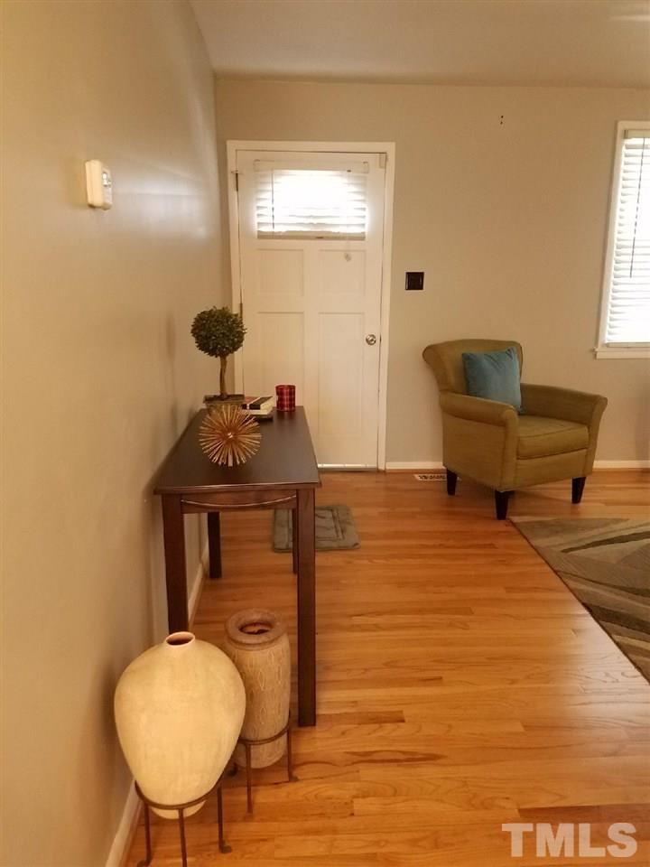 800 Newcombe Road Raleigh, NC 27610 - Photo 9 of 14 a bathroom with a sink mirror and toilet