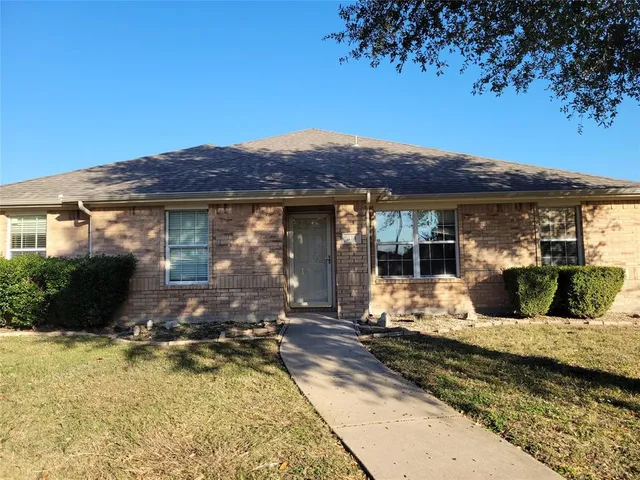 a view of a house with a patio
