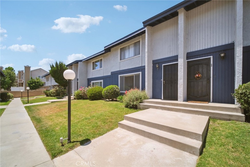 1926 Lucas Street, Unit 2 San Fernando, CA 91340 - Photo 1 of 35 a view of a house with backyard and porch