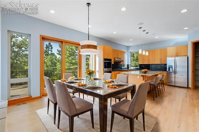 a dining room with furniture window wooden floor