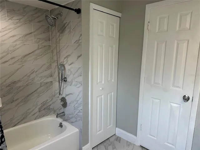 a bathroom with a bathtub