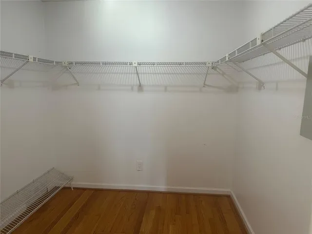 a view of a room with racks on the wall