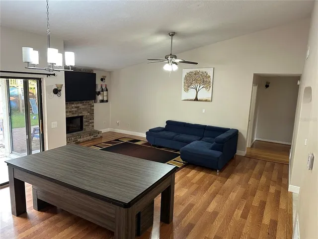 a living room with a couch and a flat screen tv